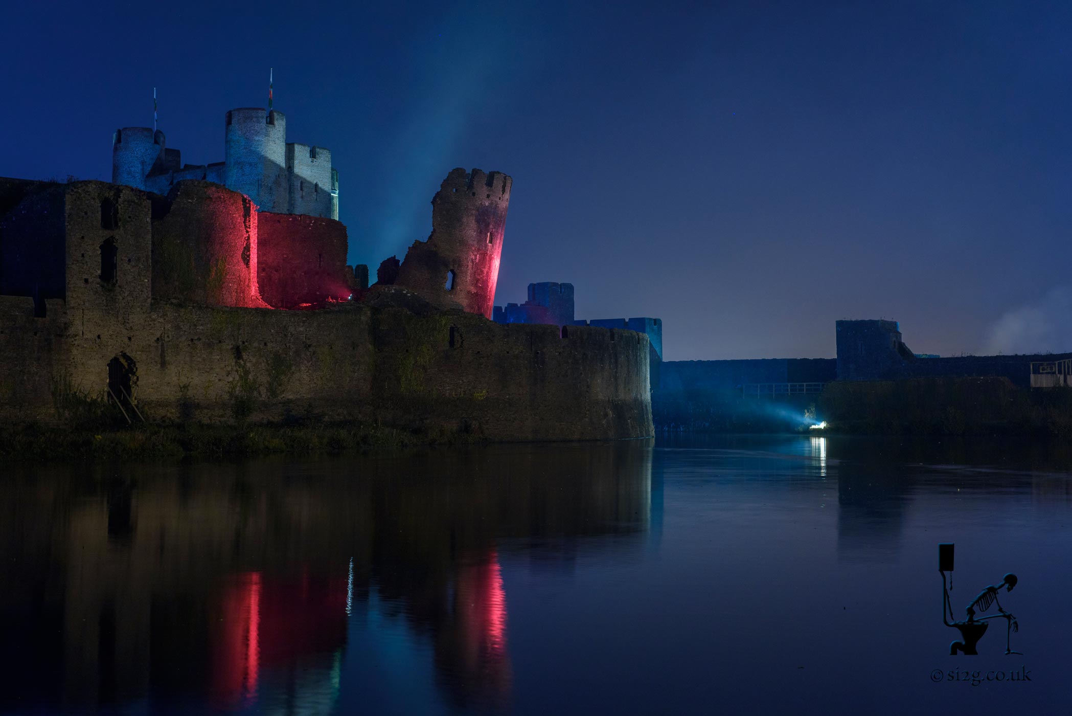 Caerphilly Illuminated - Part of a series of Welsh Tourism photos this striking image is of one of Wales most impressive castles - Caerphilly Castle.  South Wales has more castles per square mile than anywhere else in Europe.  The most cost-effective way to visit them all is become a member of Cadw, the historic environment service working for an accessible and well-protected historic environment for Wales. 
